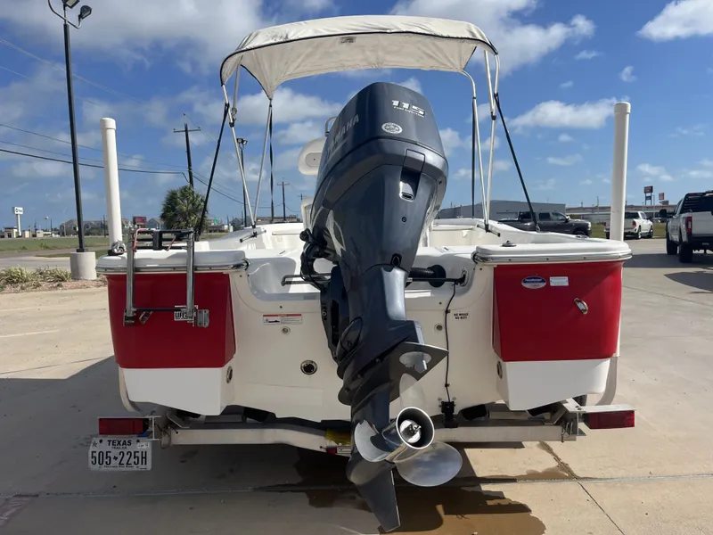 Slide: The Image of Rear view of a 2013 Sea Fox 180XT boat with outboard motor. - 9