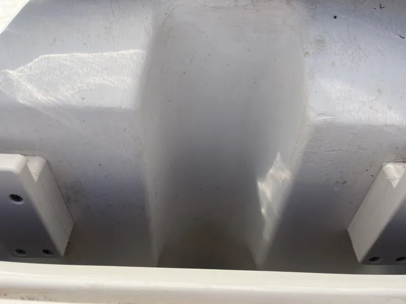 Slide: The Image of Interior of a 2016 Tahoe 550 TS boat, white surface. - 16