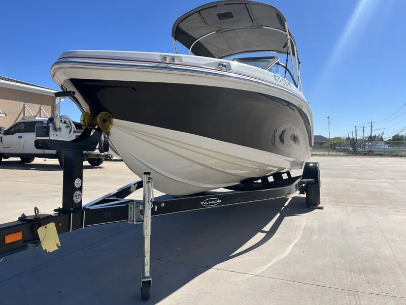 Slide: The Image of 2016 Tahoe 550 TS boat on trailer in sunny weather. - 5