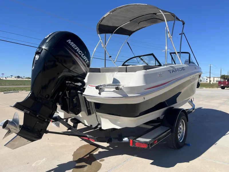Slide: The Image of 2016 Tahoe 550 TS boat with Mercury outboard motor. - 9