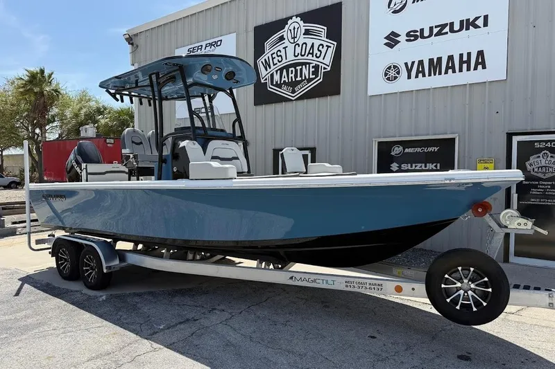 The Image of 2026 Sea Pro 250 Bay boat on trailer at West Coast Marine dealership. - 1