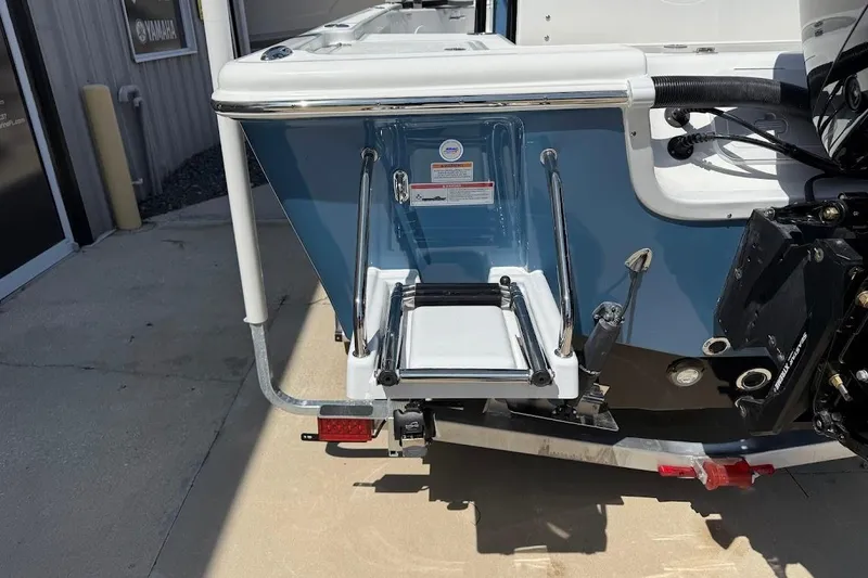 Slide: The Image of 2026 Sea Pro 250 Bay boat stern with ladder and motor mount. - 9