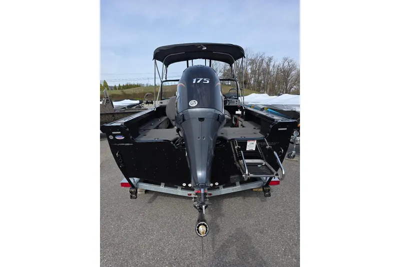 Slide: The Image of 2026 Smoker Craft Explorer 190 FS boat with powerful 175 engine, rear view. - 6