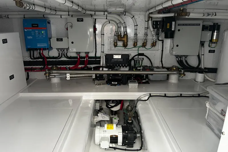 Slide: The Image of Engine room of 2026 Vicem 55 Classic yacht with electrical panels and piping. - 17