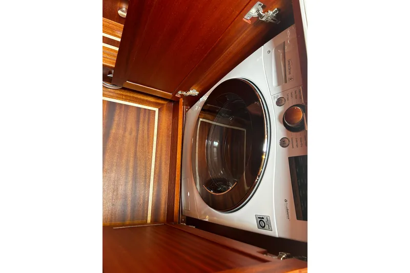 Slide: The Image of Washing machine inside Vicem 55 Classic yacht's wooden cabinet, 2026 model. - 20