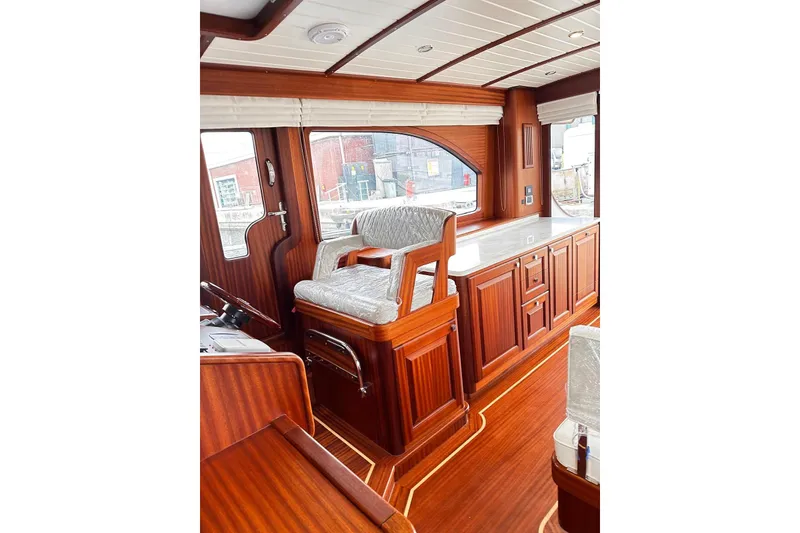 Slide: The Image of Luxurious interior of 2026 Vicem 55 Classic yacht with elegant wood finish. - 4
