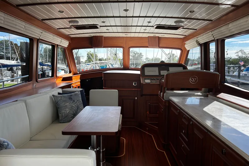 Slide: The Image of Luxurious interior of 2026 Vicem 55 Classic yacht with elegant wood finishes and modern amenities. - 5