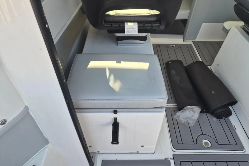 Slide: The Image of Steering wheel and dashboard of 2026 Arima 21 HT Sea Ranger boat in sunlight. - 10