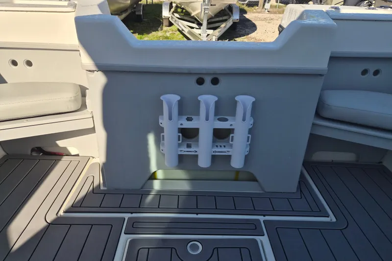 Slide: The Image of Open storage compartment on 2026 Arima 21 HT Sea Ranger boat deck. - 7