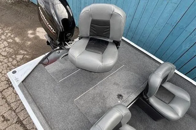 Slide: The Image of 2019 Tracker Bass Tracker Classic XL boat interior with gray seating and Mercury outboard motor. - 18