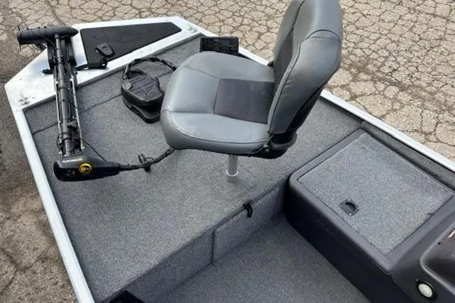 Slide: The Image of 2019 Tracker Bass Tracker Classic XL boat interior with gray seating and fishing equipment. - 6