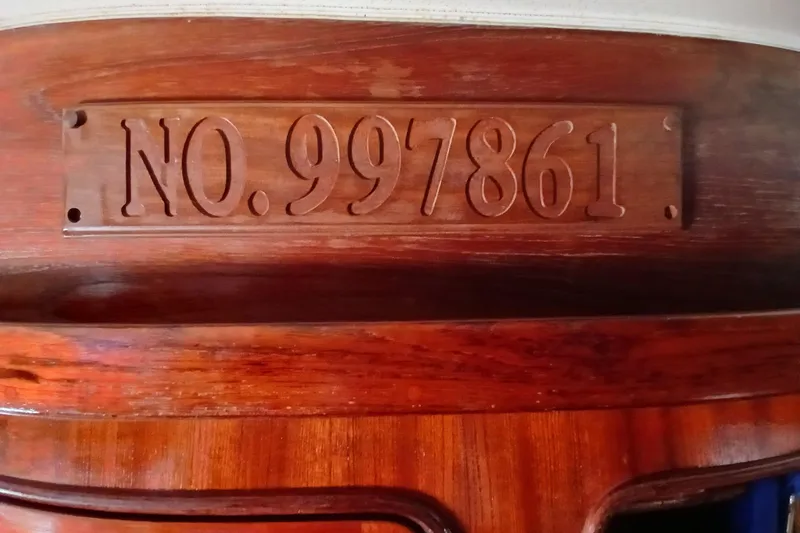 Slide: The Image of Wooden plaque with number 997861 on a 1981 Gulfstar 44 boat interior. - 20