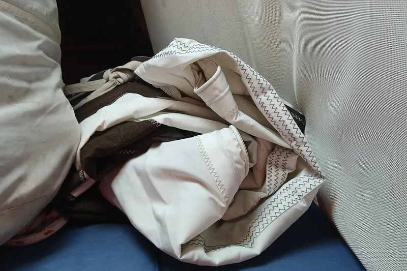 Slide: The Image of Folded sailcloth with zigzag stitching on a 1981 Gulfstar 44 yacht. - 42