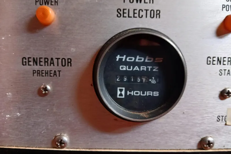 Slide: The Image of Hobbs Quartz hour meter on 1981 Gulfstar 44 generator panel. - 46