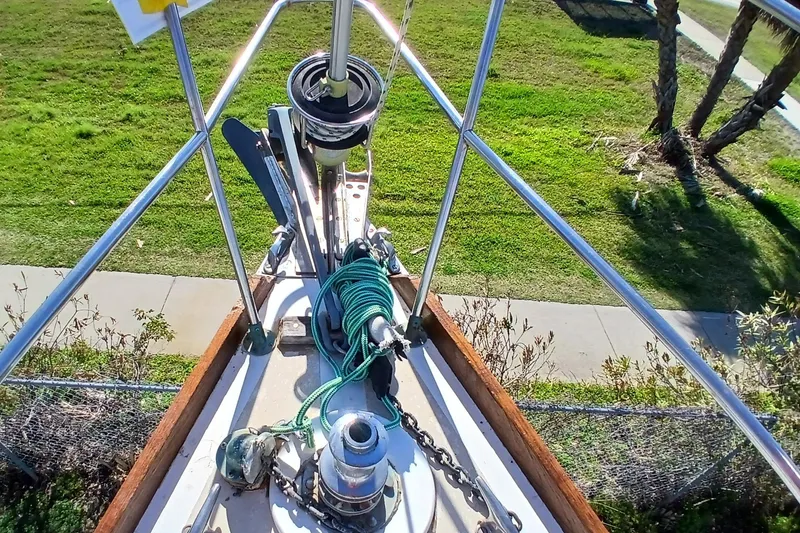 Slide: The Image of Bow of 1981 Gulfstar 44 sailboat with anchor and green rope. - 57