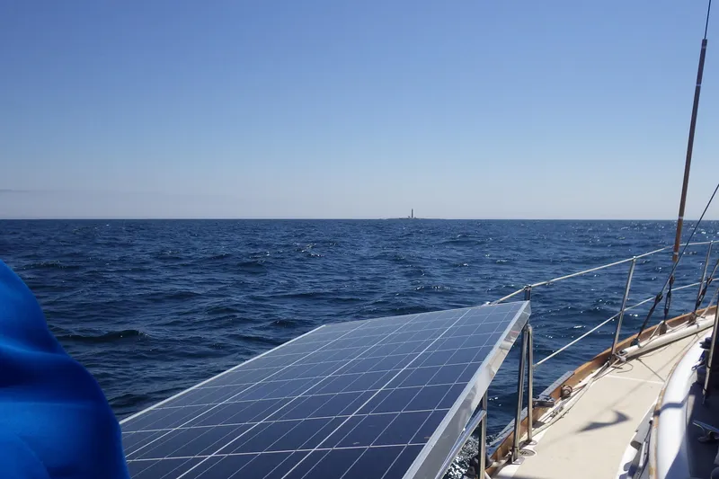 Slide: The Image of Sailing on a 1981 Gulfstar 44 with solar panels, open sea view. - 68