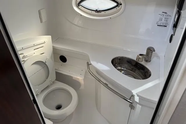 Slide: The Image of Bathroom interior of 2019 Monterey 355 Sport Yacht with toilet and sink. - 14