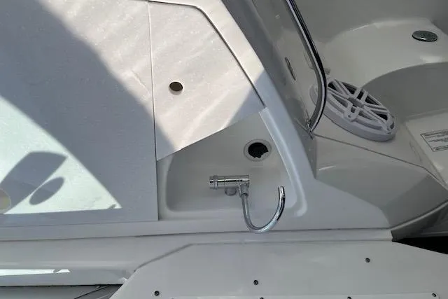 Slide: The Image of 2019 Monterey 355 Sport Yacht interior detail with speaker and chrome fixture. - 8