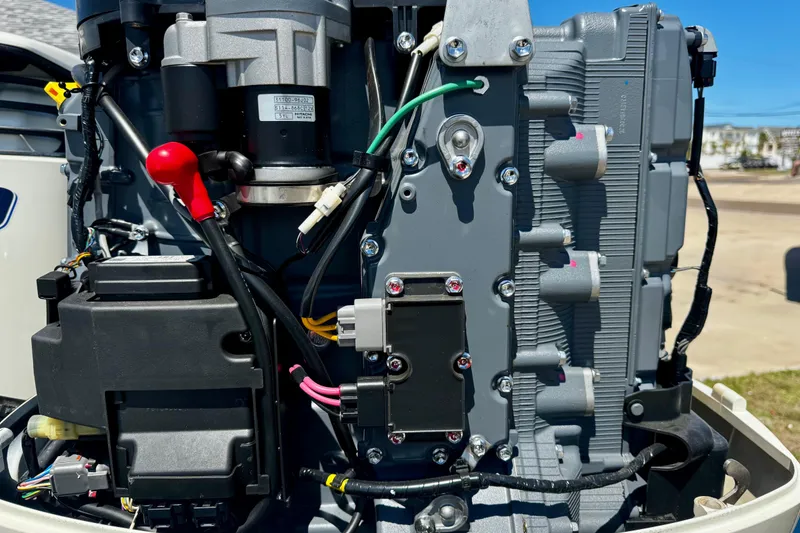 Slide: The Image of Close-up of a 2000 Glacier Bay 2670 Isle Runner boat engine components. - 10