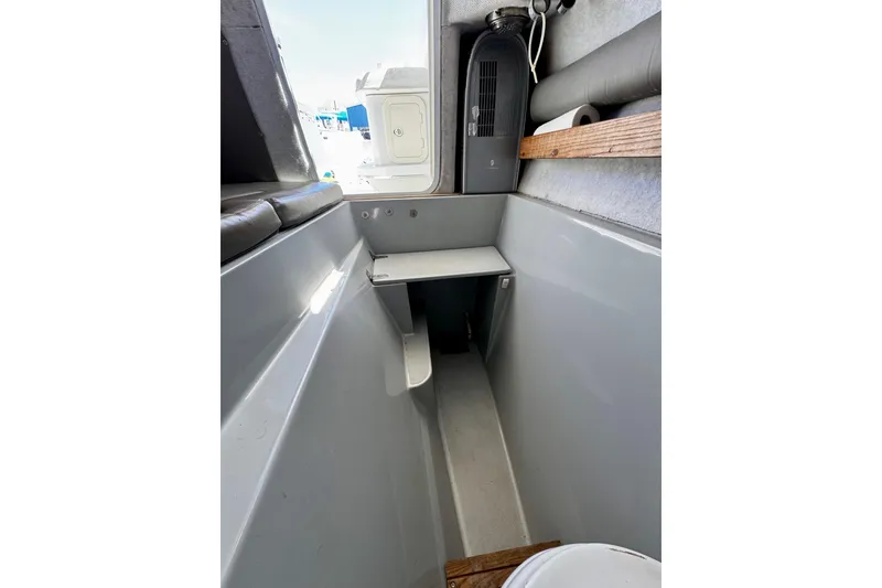 Slide: The Image of Interior view of a 2000 Glacier Bay 2670 Isle Runner boat cabin. - 39