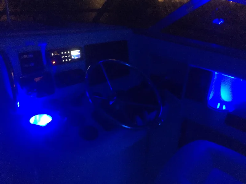 Slide: The Image of Illuminated cockpit of a 2000 Glacier Bay 2670 Isle Runner. - 41