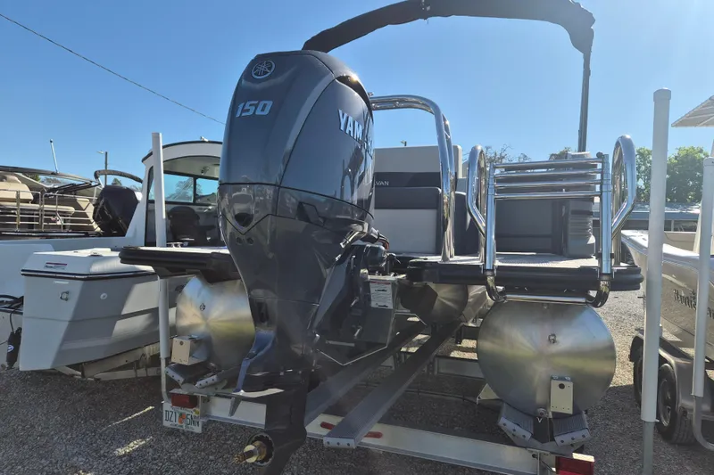 Slide: The Image of 2026 Sylvan R-22 CLZ DH pontoon boat with Yamaha 150 engine on trailer. - 3