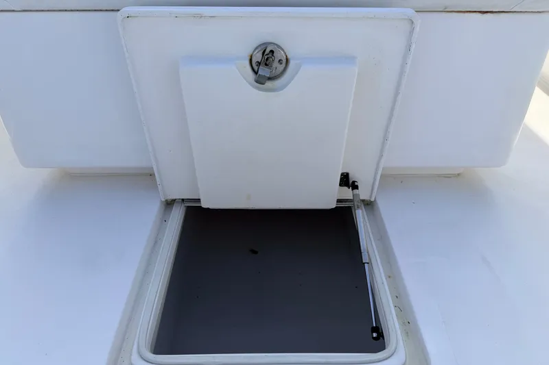 Slide: The Image of Open hatch on 2008 SeaHunter 40 Tournament boat, showcasing storage compartment. - 28