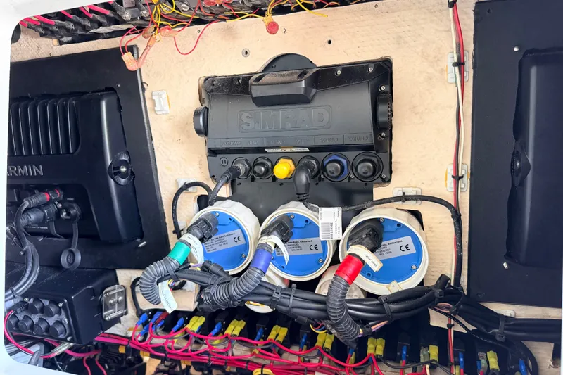 Slide: The Image of Electrical system of a 2008 SeaHunter 40 Tournament boat with Simrad and Garmin components. - 20