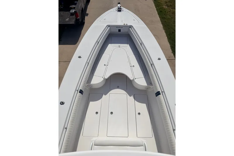 Slide: The Image of 2008 SeaHunter 40 Tournament boat deck, spacious layout, white finish, ideal for fishing. - 34