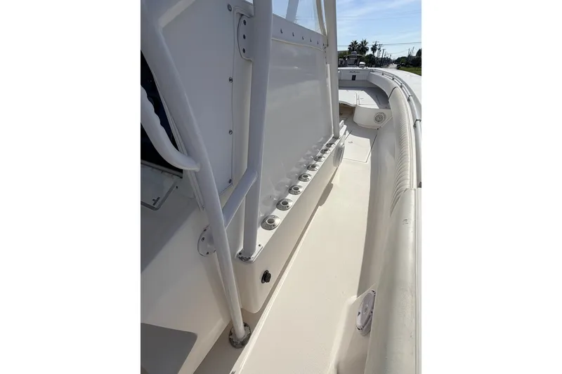 Slide: The Image of 2008 SeaHunter 40 Tournament boat deck with rod holders and seating area. - 14
