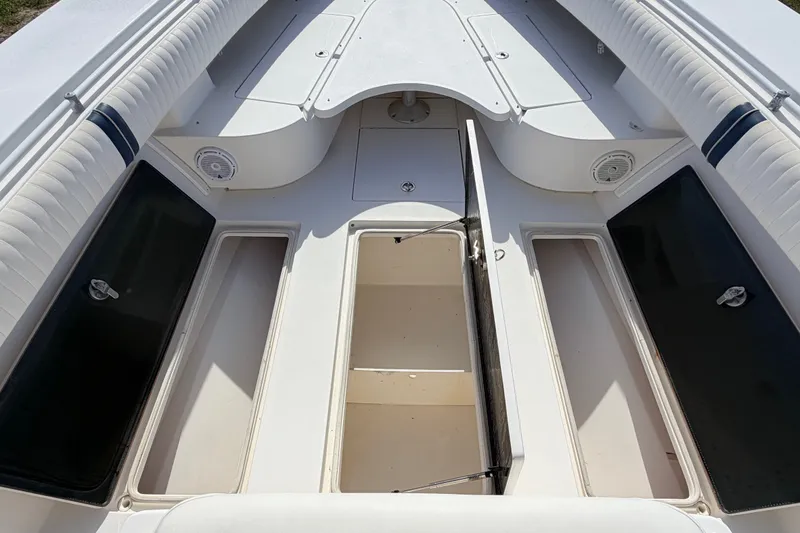 Slide: The Image of 2008 SeaHunter 40 Tournament boat interior with open storage compartments. - 15