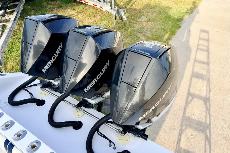 Slide: The Image of Triple Mercury outboard engines on a 2008 SeaHunter 40 Tournament boat. - 5