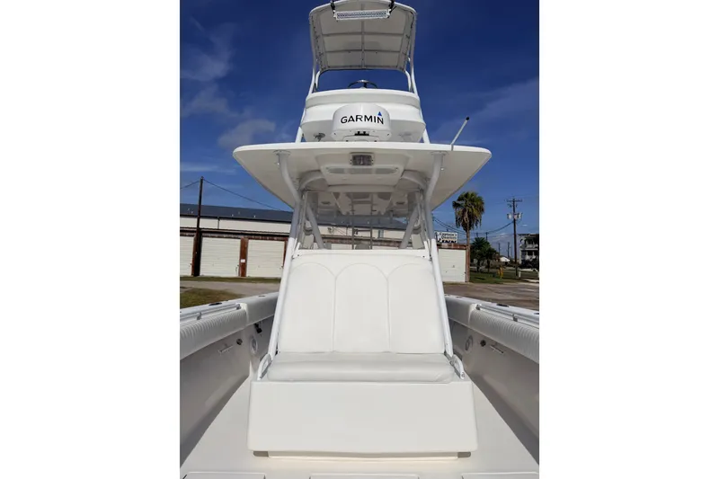 Slide: The Image of 2008 SeaHunter 40 Tournament boat with Garmin equipment, featuring a sleek white design. - 18