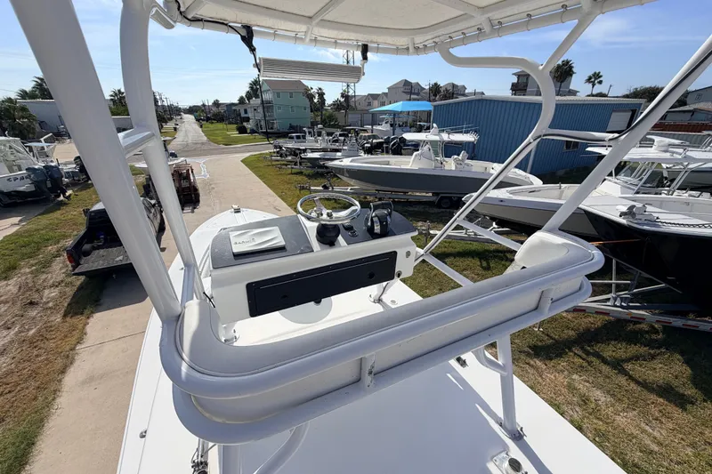 Slide: The Image of Tower view of 2008 SeaHunter 40 Tournament boat, showcasing helm and surrounding boats. - 30