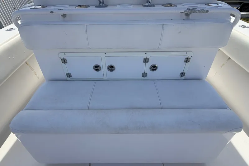 Slide: The Image of White seating area on a 2008 SeaHunter 40 Tournament boat with storage compartments. - 25