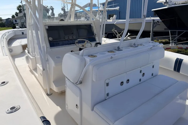 Slide: The Image of 2008 SeaHunter 40 Tournament boat interior with helm and seating area. - 6