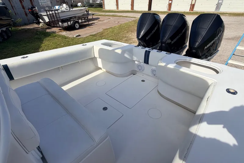 Slide: The Image of 2008 SeaHunter 40 Tournament boat interior with triple Mercury engines. - 23