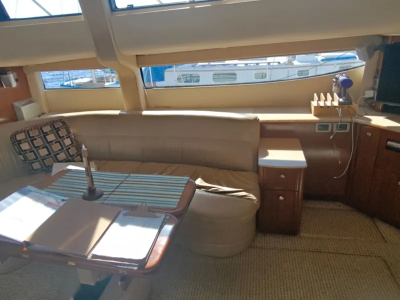 Slide: The Image of Interior of 2005 Meridian 408 Motoryacht with sofa and table. - 17