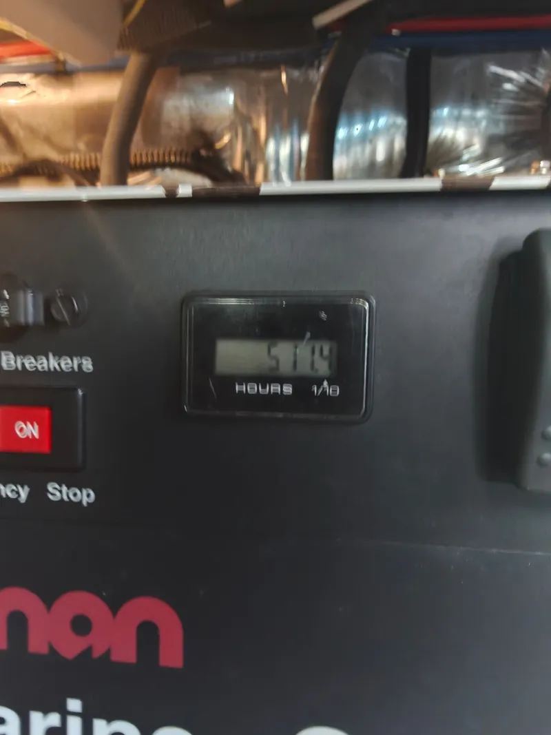 Slide: The Image of Hour meter on Meridian 408 Motoryacht, displaying 519 hours. - 38