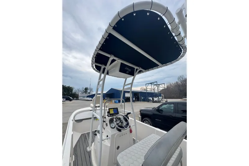 Slide: The Image of 2024 Carolina Skiff 192 JLS boat with T-top and modern console. - 5