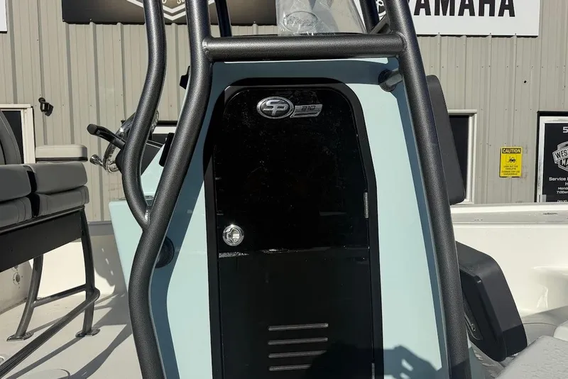 Slide: The Image of 2026 Sea Pro 210 Bay boat console with black panel and sturdy frame. - 11