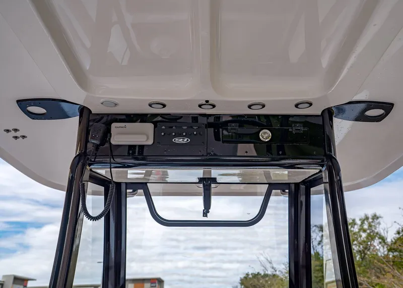 Slide: The Image of Interior view of Sea Hunt ULTRA 305 CB 2026 with electronics. - 18