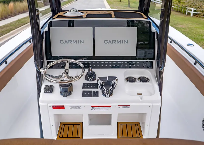 Slide: The Image of Helm console of Sea Hunt ULTRA 305 CB boat, year 2026. - 19