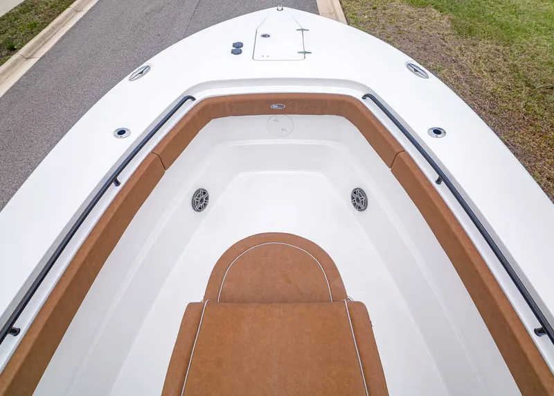 Slide: The Image of Bow of Sea Hunt ULTRA 305 CB 2026 with brown upholstery. - 29