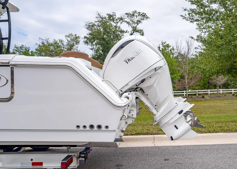 Slide: The Image of Sea Hunt ULTRA 305 CB 2026 with Yamaha outboard motor. - 3