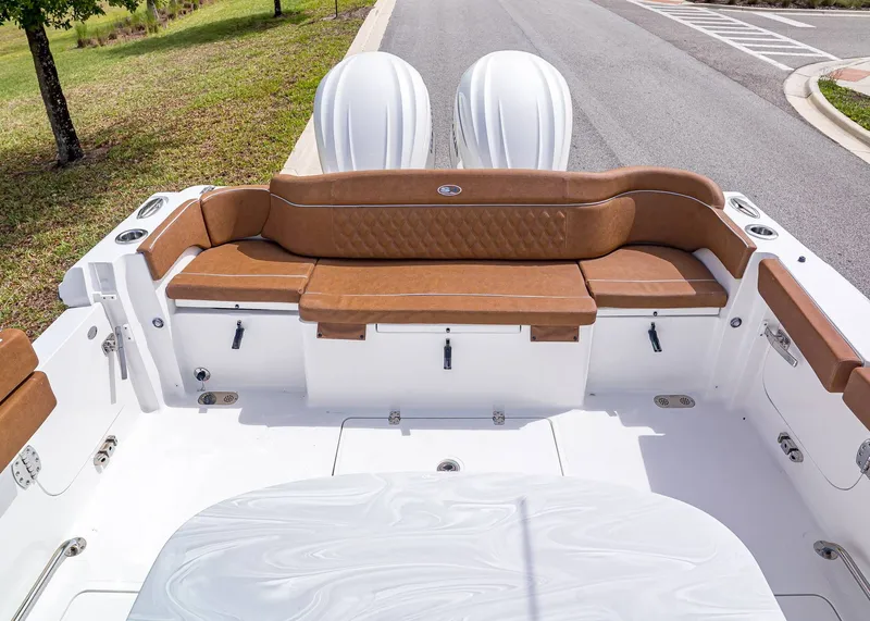 Slide: The Image of Interior of Sea Hunt ULTRA 305 CB 2026 with brown seating. - 5