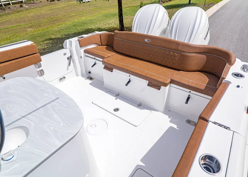 Slide: The Image of Interior of Sea Hunt ULTRA 305 CB 2026 with brown seating. - 6