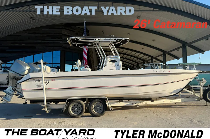 The Image of 2007 Twin Vee 26 Center Console catamaran on trailer at The Boat Yard. - 1