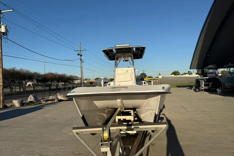 Slide: The Image of 2007 Twin Vee 26 Center Console boat on trailer in outdoor storage area. - 4