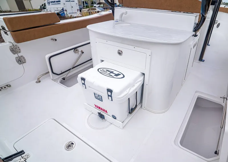 Slide: The Image of Interior of Sea Hunt ULTRA 305 CB boat, model year 2026. - 16